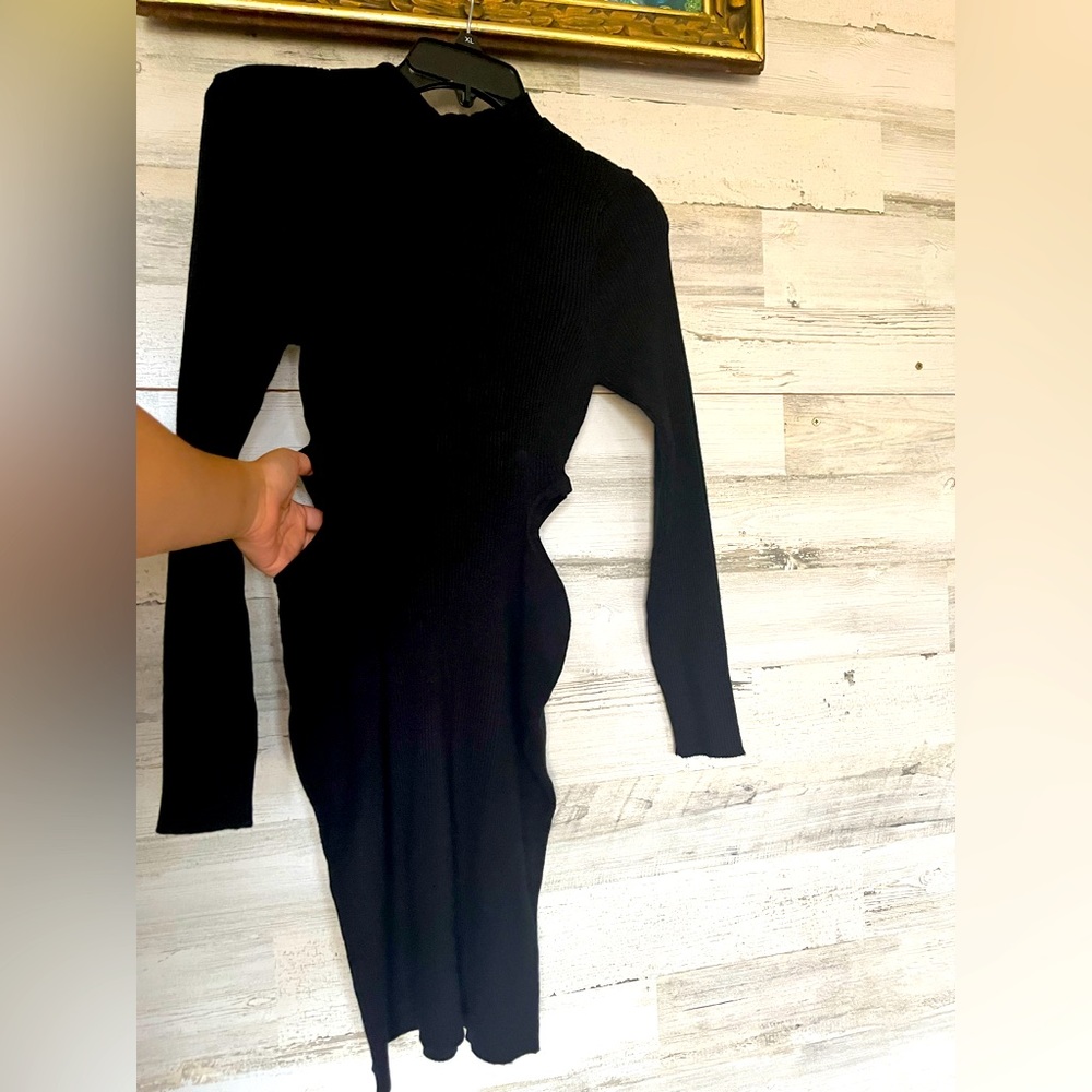 High neck sweater dress with side cutouts.NWT